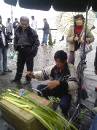 Man Making Palm Leaf Grasshoppers And Fish * copy=